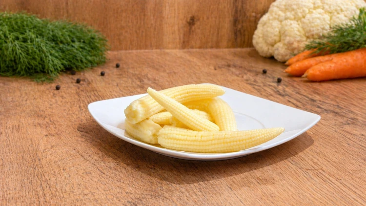 Hungarian pickled baby corn, a mild and crunchy side dish for salads, appetizers, and snack boards.