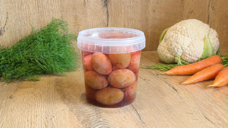 Hungarian plums pickled in vinegar, a sweet and tangy side dish for meats, cheeses, and appetizers.