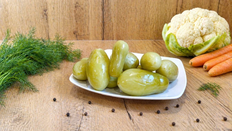 Hungarian green tomatoes pickled in vinegar, perfect for salads and party appetizer platters.