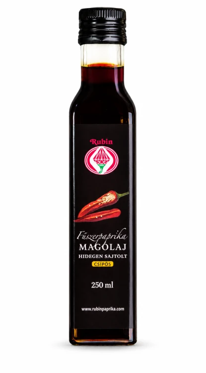 Węgierski olej z pestek ostrej papryki Rubin 250 ml, tłoczony na zimno. Pikantny, aromatyczny dodatek do sałatek, marynat i dań kuchni węgierskiej. Dostępny w OstryStefek.pl.