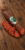 Palatin Mangalica Szalámi pork salami on rustic wooden boards, with a visible cut end and thin slices in the foreground.