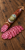 Palatin Szamár Szalámi Csemege mild donkey salami in a natural beef casing, displayed with thin slices on rustic wooden boards.