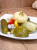 Mild Hungarian pickled vegetable mix Darabos Savanyúság served on a plate.