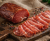 Hungarian dry-cured, smoked pork tenderloin is delicate charcuterie sliced paper-thin prosciutto-style. Clean, savory aroma and firm texture—perfect for rustic boards, premium sandwiches, and elegant tasting plates.