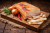 Hungarian smoked and dry-aged Mangalica pork fat – traditional artisanal delicacy with a creamy texture and rich natural smoke aroma. Presented on a rustic wooden board, perfect for serving with fresh bread and classic European appetizers.
